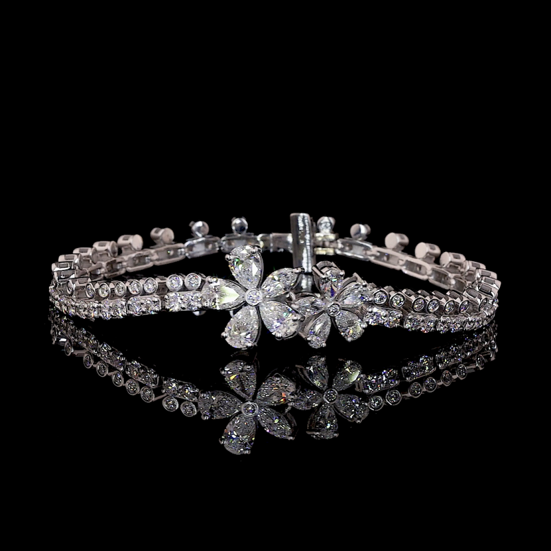 14k White Gold Fancy Bracelet made with Lab Grown Pears and Rounds and Marquise Diamonds 14k White Gold Fancy Bracelet made with Lab Grown Pears and Rounds and Marquise Diamonds