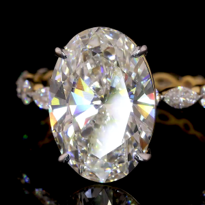 Exquisite Oval Diamond Ring in 14k Gold – Side Stone Engagement Ring